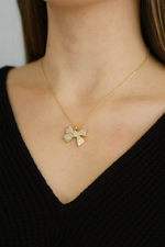 Radiant Gold Ribbon Pendant Necklace