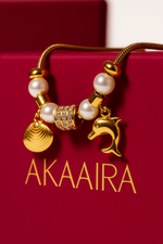 Gold Oceanic charm bracelet