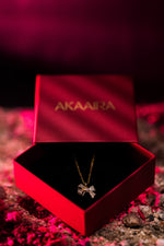 Radiant Gold Ribbon Pendant Necklace