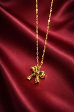 Golden Pearl Bow Necklace